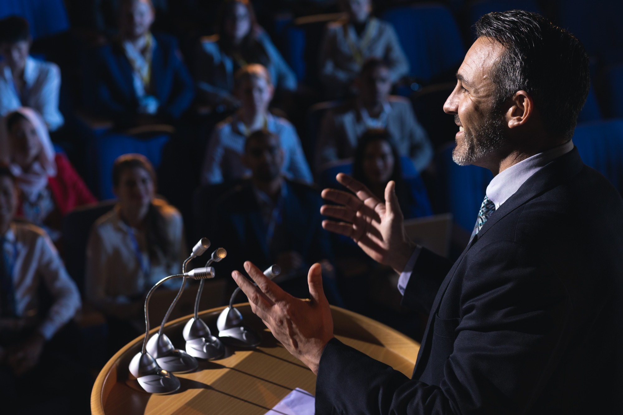 Man standing and giving presentation